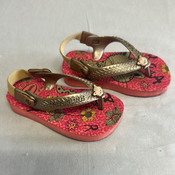 Havaianas Pink and Gold Flip Flops with Floral Pattern - Picture 2 of 5